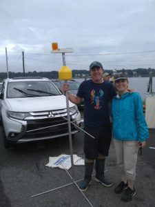 students with a buoy