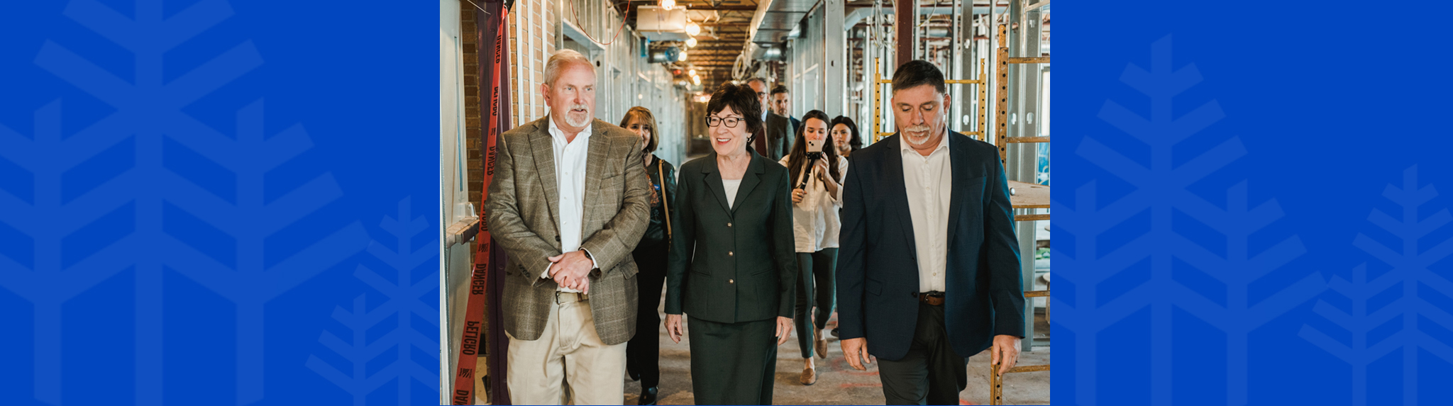 Sen. Susan Collins walks with President Jim Dlugos in the Center for Nursing Innovation currently under construction at Saint Joseph's College of Maine