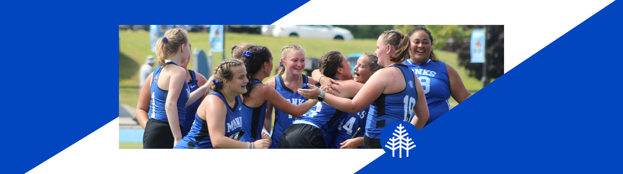 Field hockey team celebrates a win